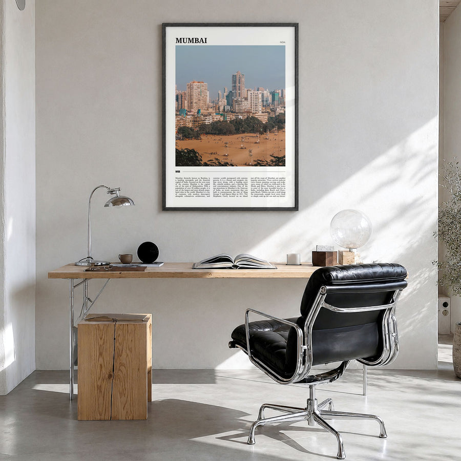 Mumbai Travel Poster in a black wood frame, hanging in a bright home office