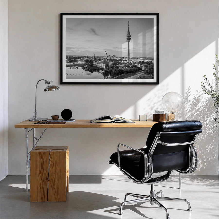 Munich black & white photo poster of Germany – horizontal wall art in black wood frame with white border, hanging on wall