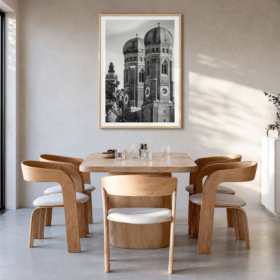 Munich Photo No 2 Poster in a natural wood frame, hanging in a dining room, white border