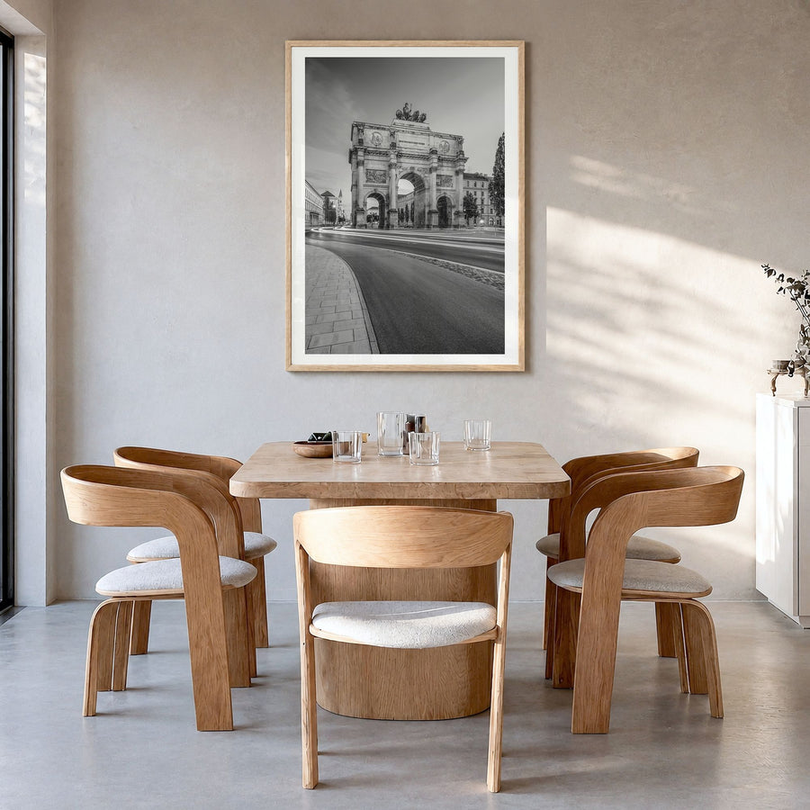 Munich Photo No 3 Poster in a natural wood frame, hanging in a dining room, white border