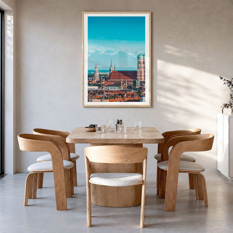 Munich Photo No 1 Poster in a natural wood frame, hanging in a dining room, white border