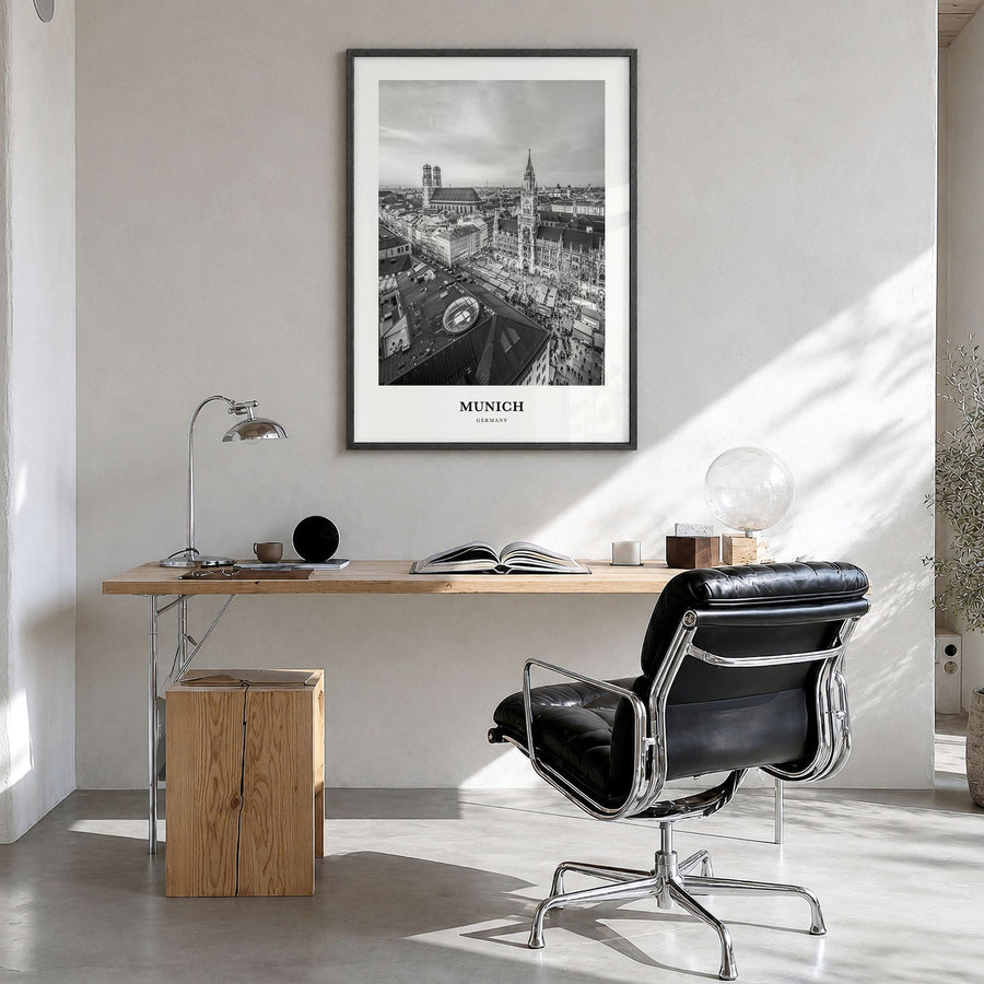 Munich Classic Poster in a black wood frame, hanging in a bright home office