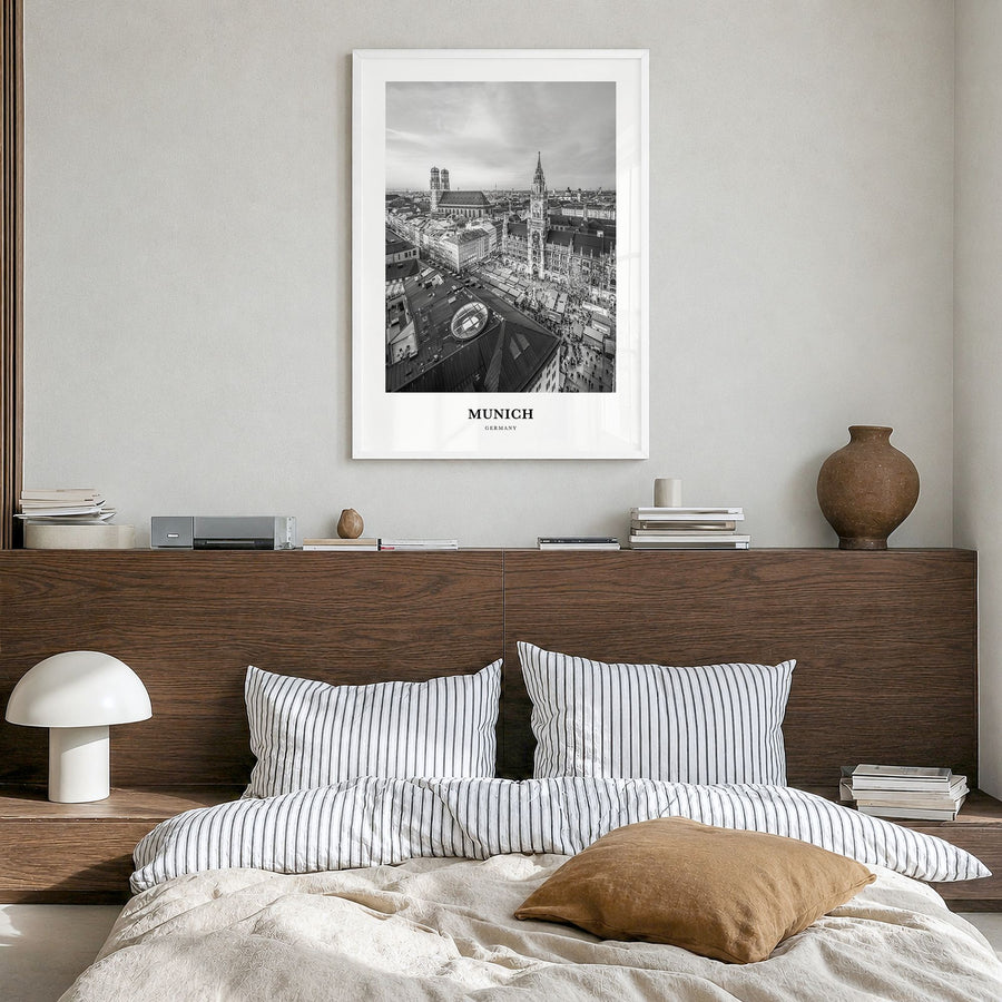 Munich Classic Poster in a white wood frame, hanging in a bedroom