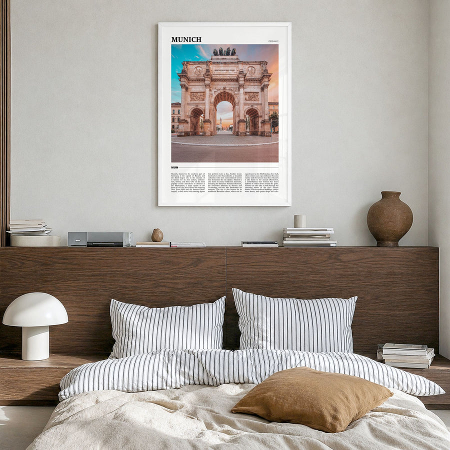 Munich Travel Poster in a white wood frame, hanging in a bedroom