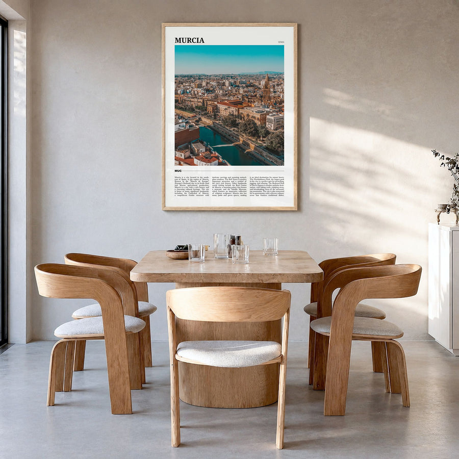 Murcia Travel Poster in a natural wood frame, hanging in a dining room