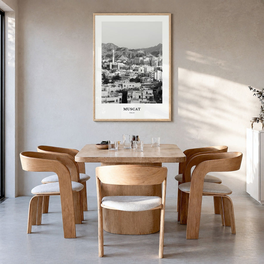 Muscat Classic Poster in a natural wood frame, hanging in a dining room