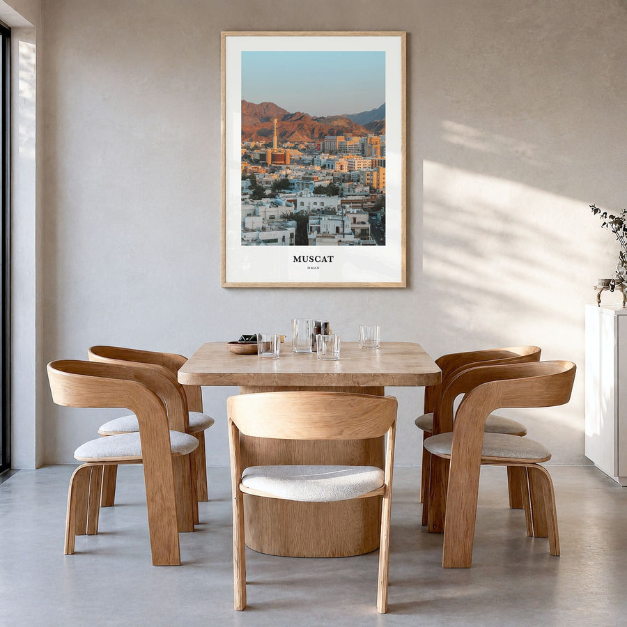 Muscat Classic Poster in a natural wood frame, hanging in a dining room