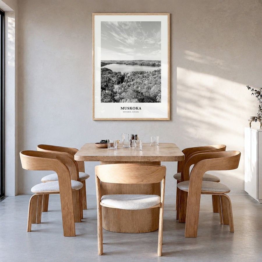 Muskoka Classic Poster in a natural wood frame, hanging in a dining room