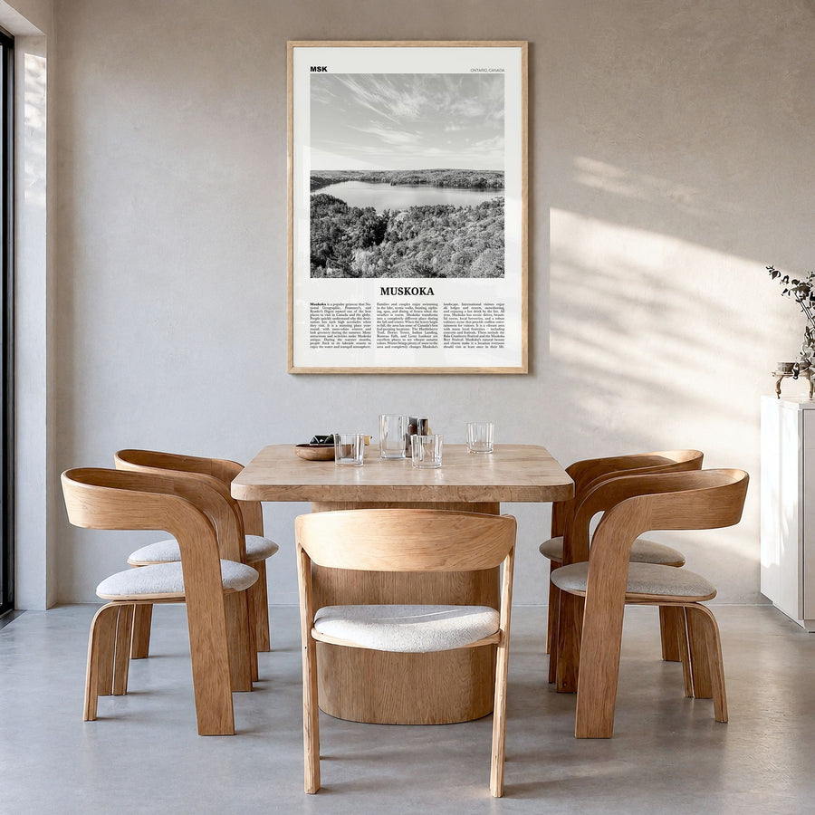 Muskoka Newspaper Poster in a natural wood frame, hanging in a dining room