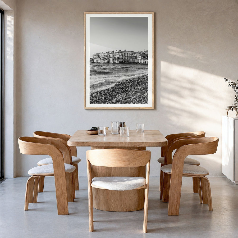 Mykonos Photo Poster in a natural wood frame, hanging in a dining room, white border