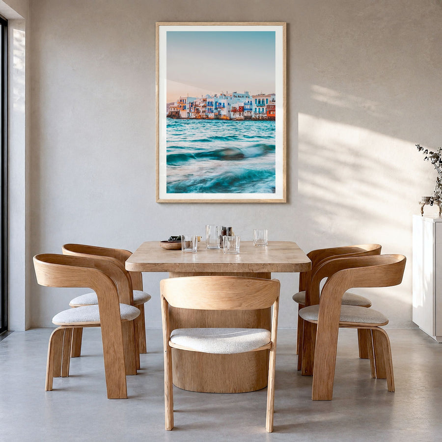 Mykonos Photo Poster in a natural wood frame, hanging in a dining room, white border