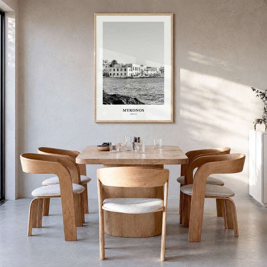 Mykonos Classic Poster in a natural wood frame, hanging in a dining room