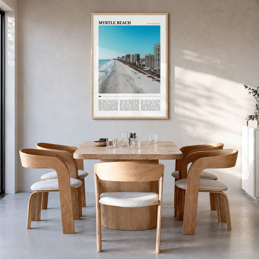 Myrtle Beach Travel Poster in a natural wood frame, hanging in a dining room