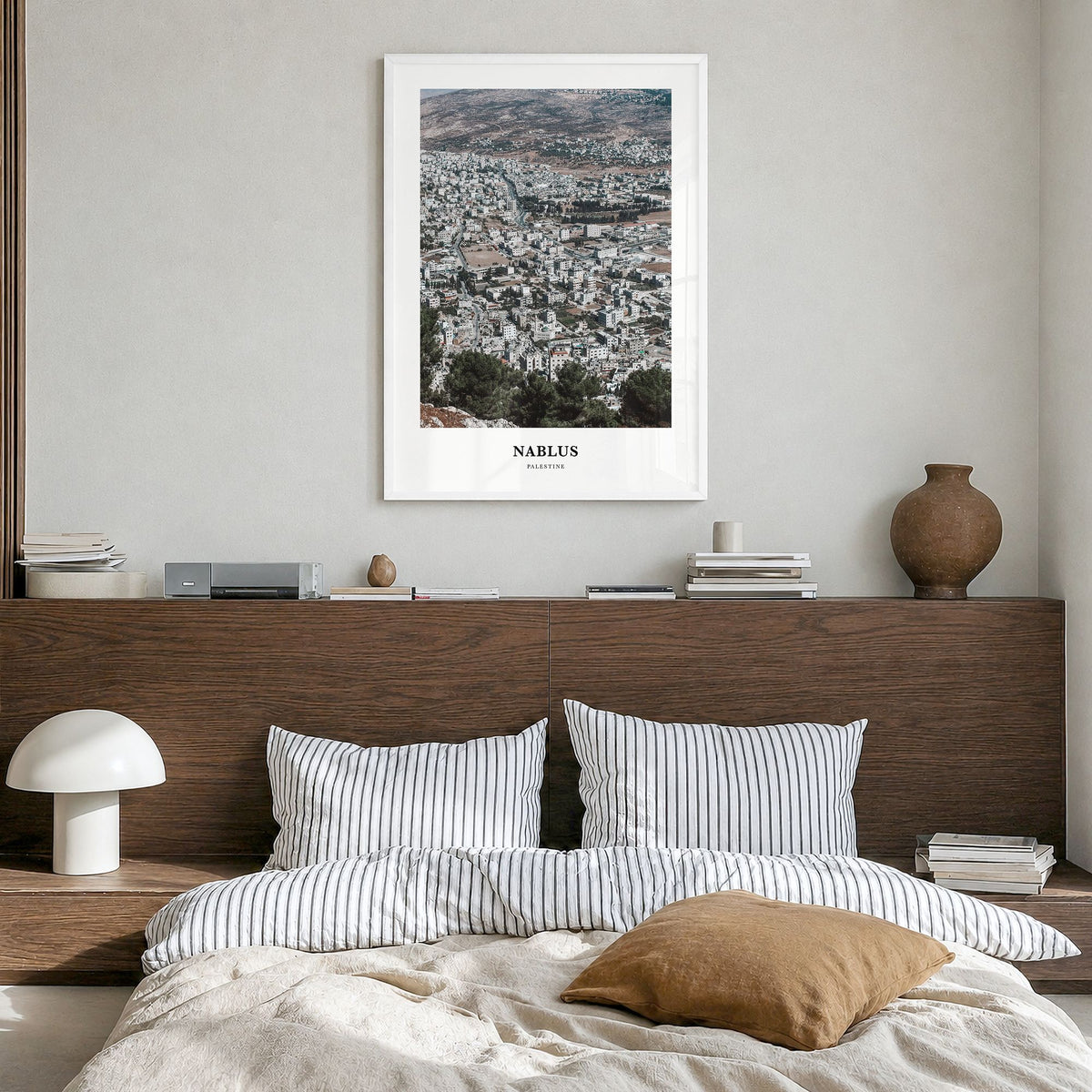Nablus Classic Poster in a white wood frame, hanging in a bedroom