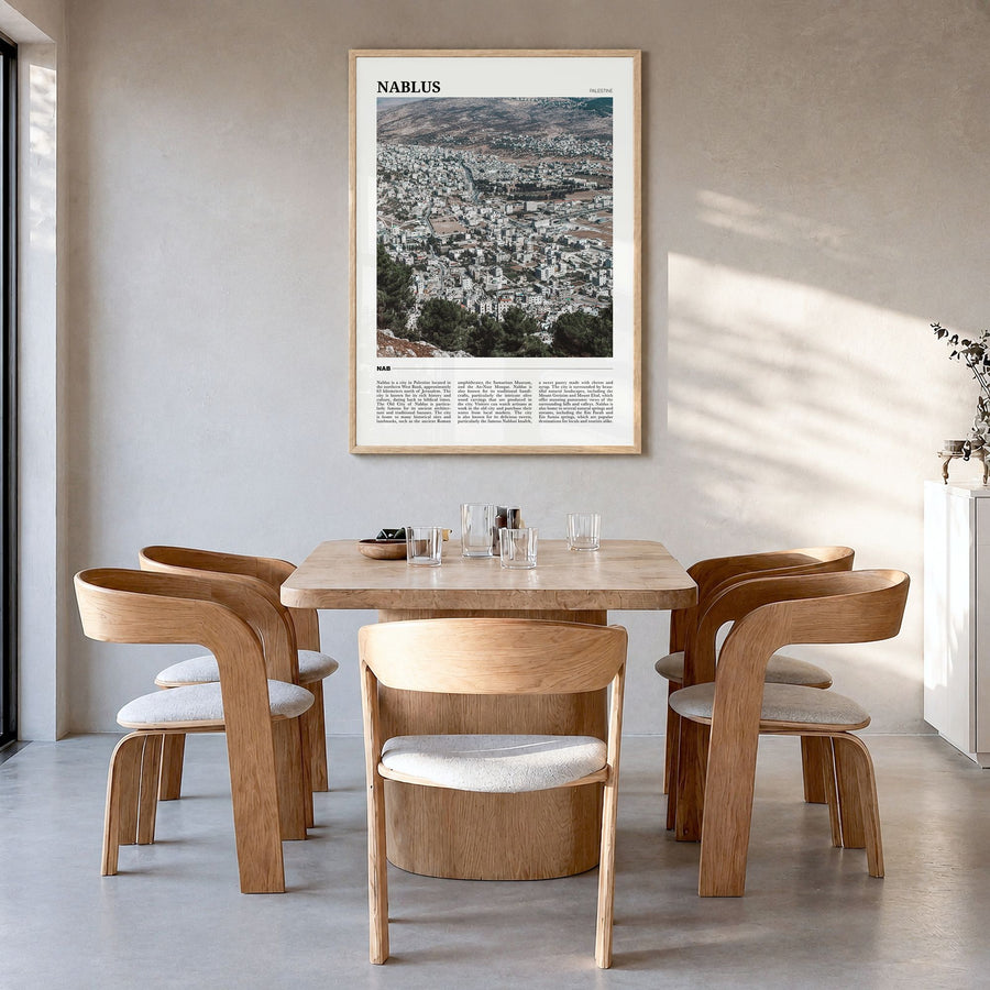 Nablus Travel Poster in a natural wood frame, hanging in a dining room