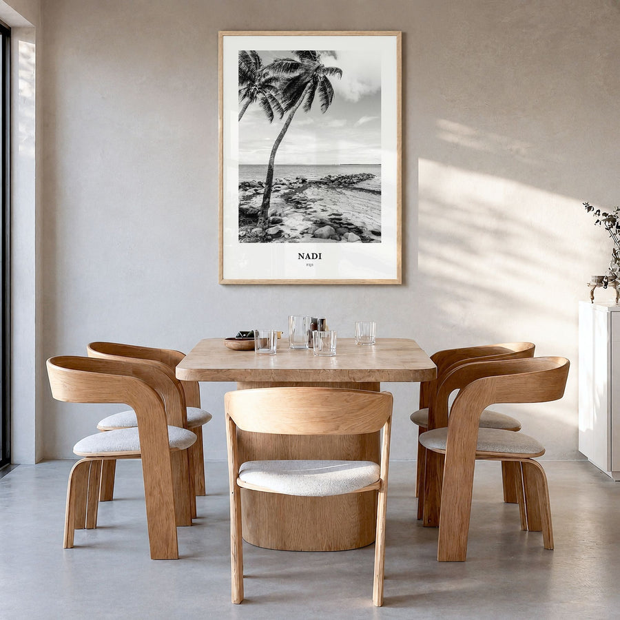 Nadi Classic Poster in a natural wood frame, hanging in a dining room
