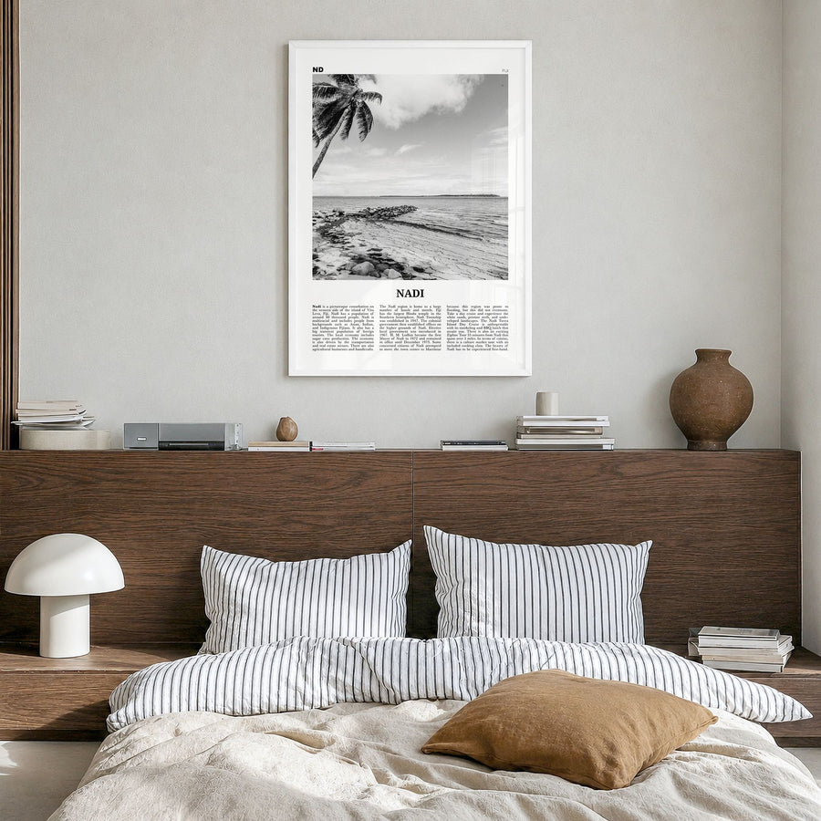 Nadi Newspaper Poster in a white wood frame, hanging in a bedroom
