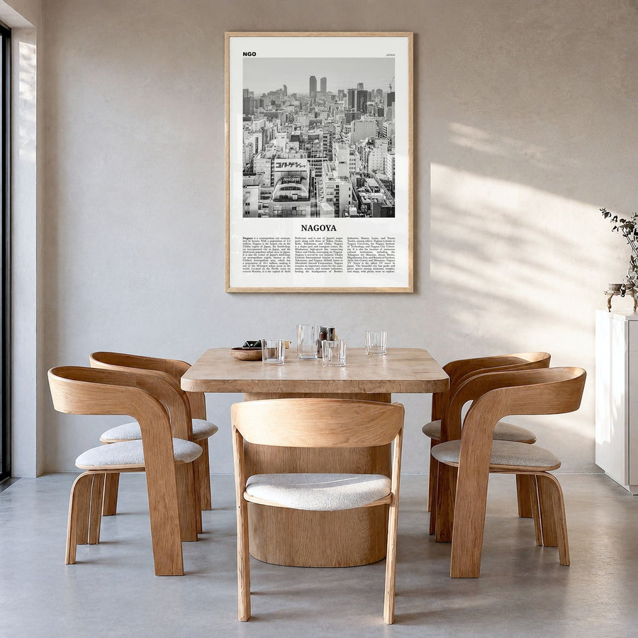Nagoya Newspaper Poster in a natural wood frame, hanging in a dining room