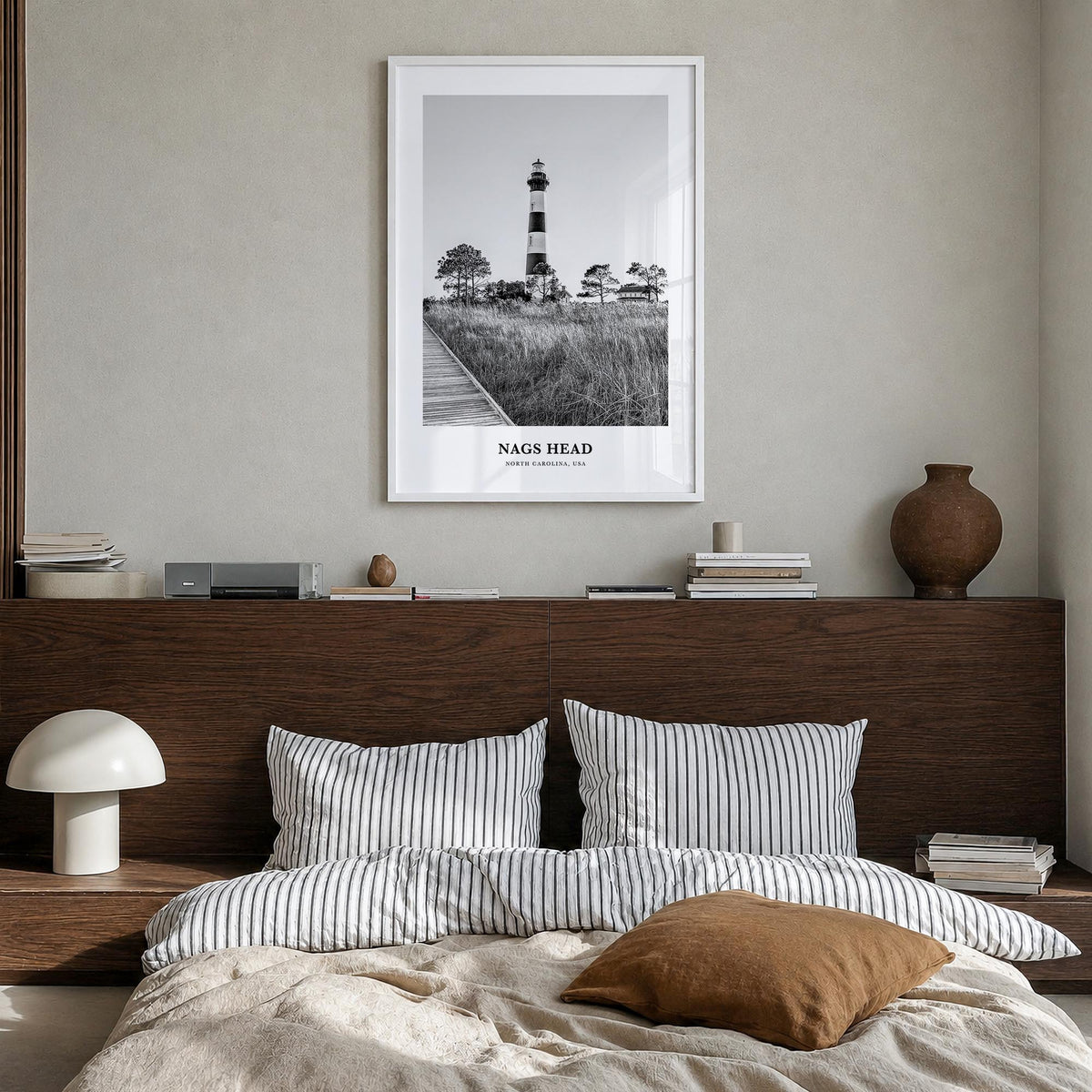 Nags Head black & white classic poster of North Carolina, USA – vertical wall art in white wood frame, hanging on wall