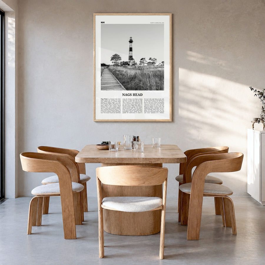 Nags Head Newspaper Poster in a natural wood frame, hanging in a dining room