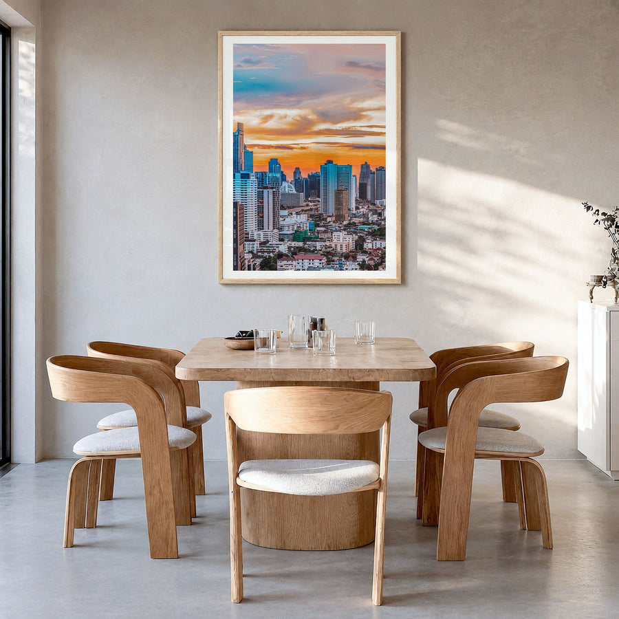 Nairobi Photo Poster in a natural wood frame, hanging in a dining room, white border