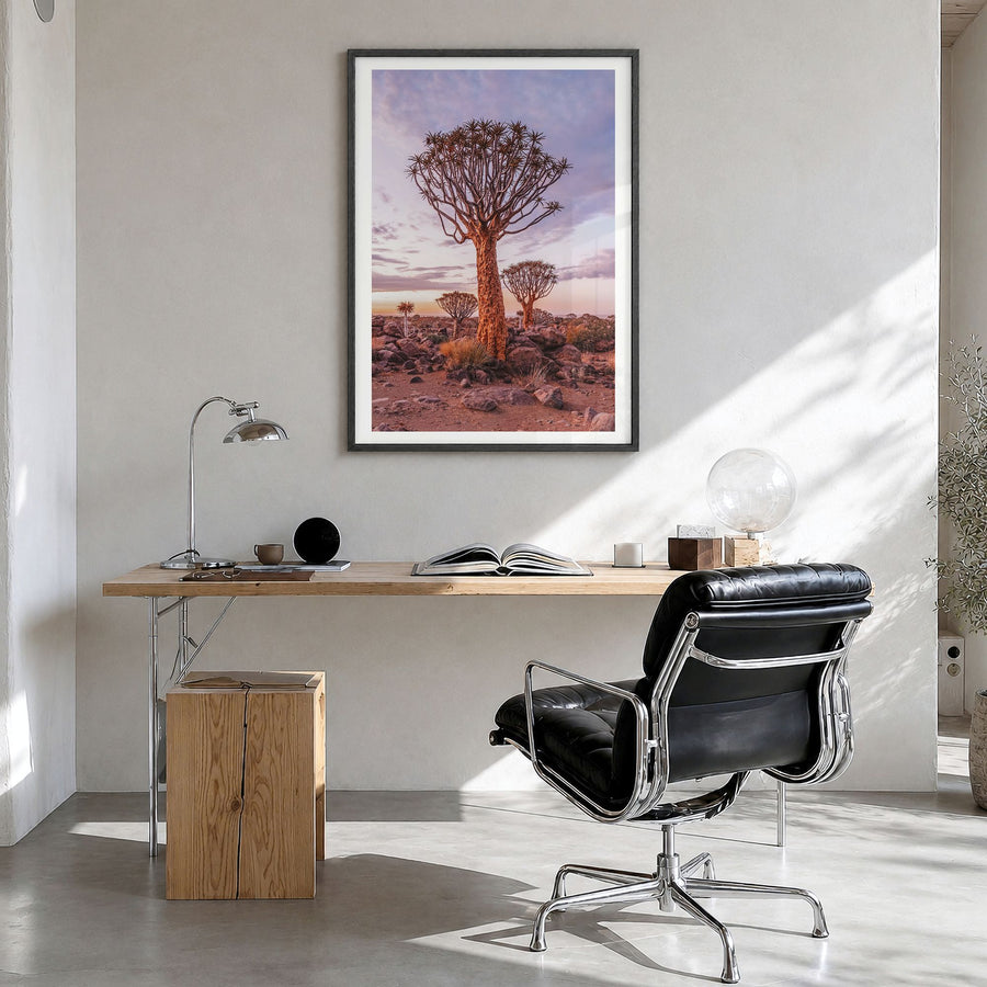 Namibia Photo Poster in a black wood frame, hanging in a bright home office, white border
