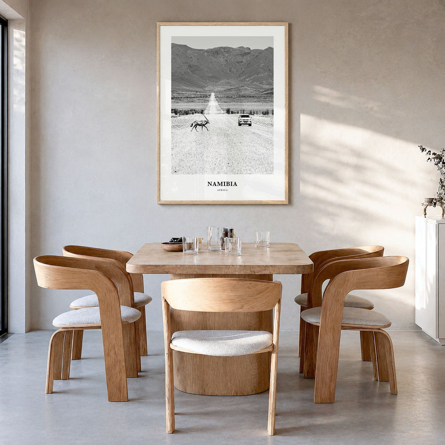 Namibia Classic Poster in a natural wood frame, hanging in a dining room