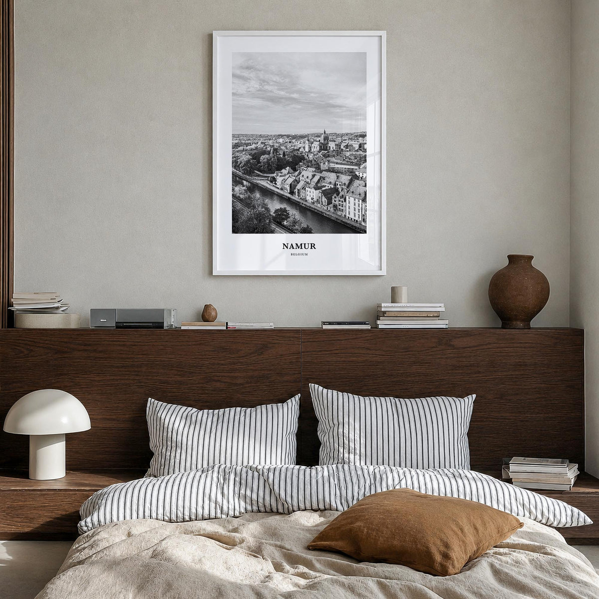 Namur black & white classic poster of Belgium – vertical wall art in white wood frame, hanging on wall