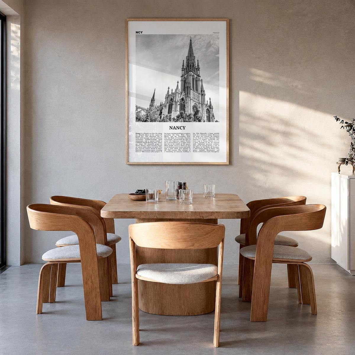 Nancy black & white newspaper poster of France – vertical wall art in natural wood frame, hanging on wall