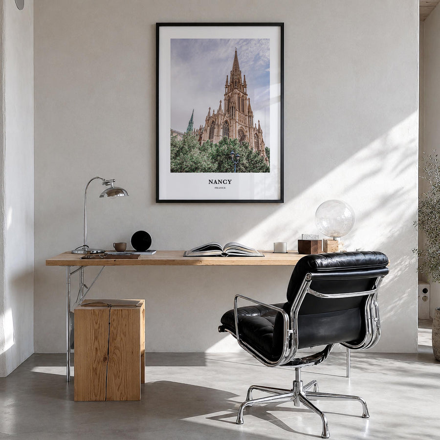 Nancy colorful classic poster of France – vertical wall art in black wood frame, hanging on wall