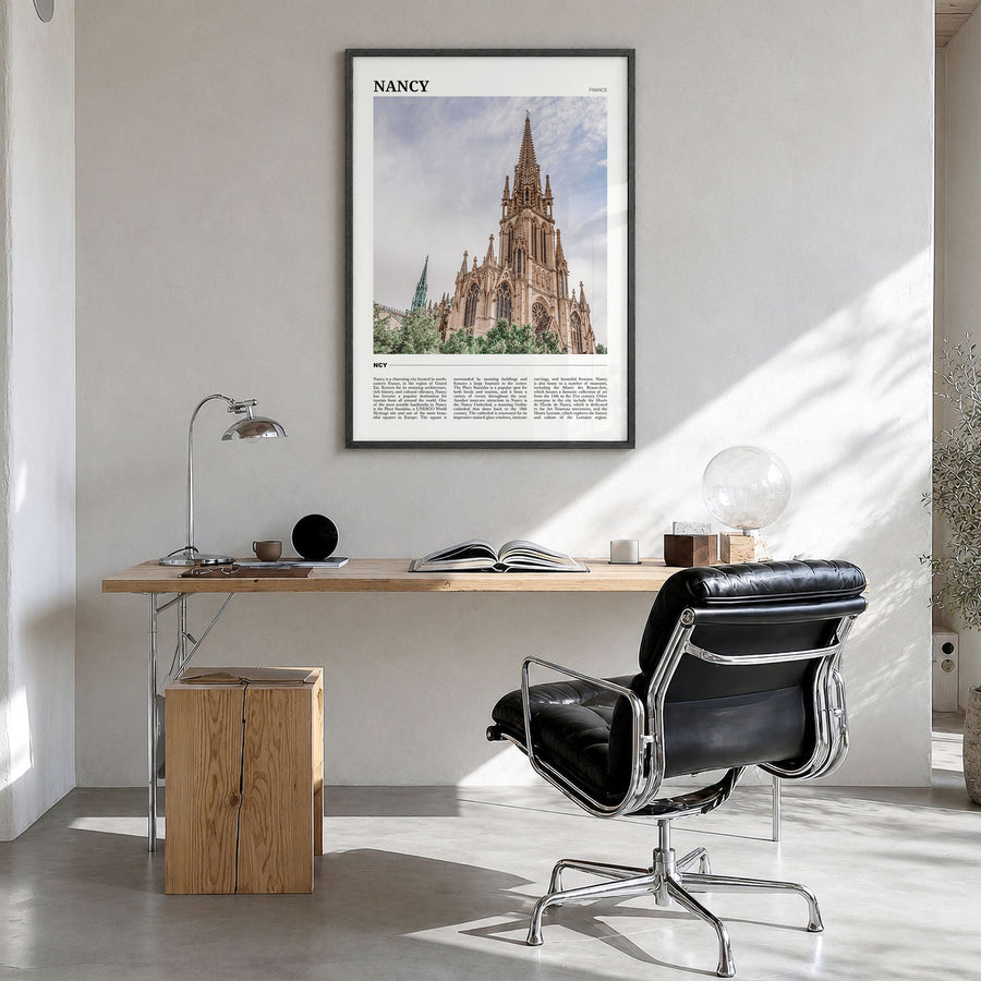 Nancy Travel Poster in a black wood frame, hanging in a bright home office