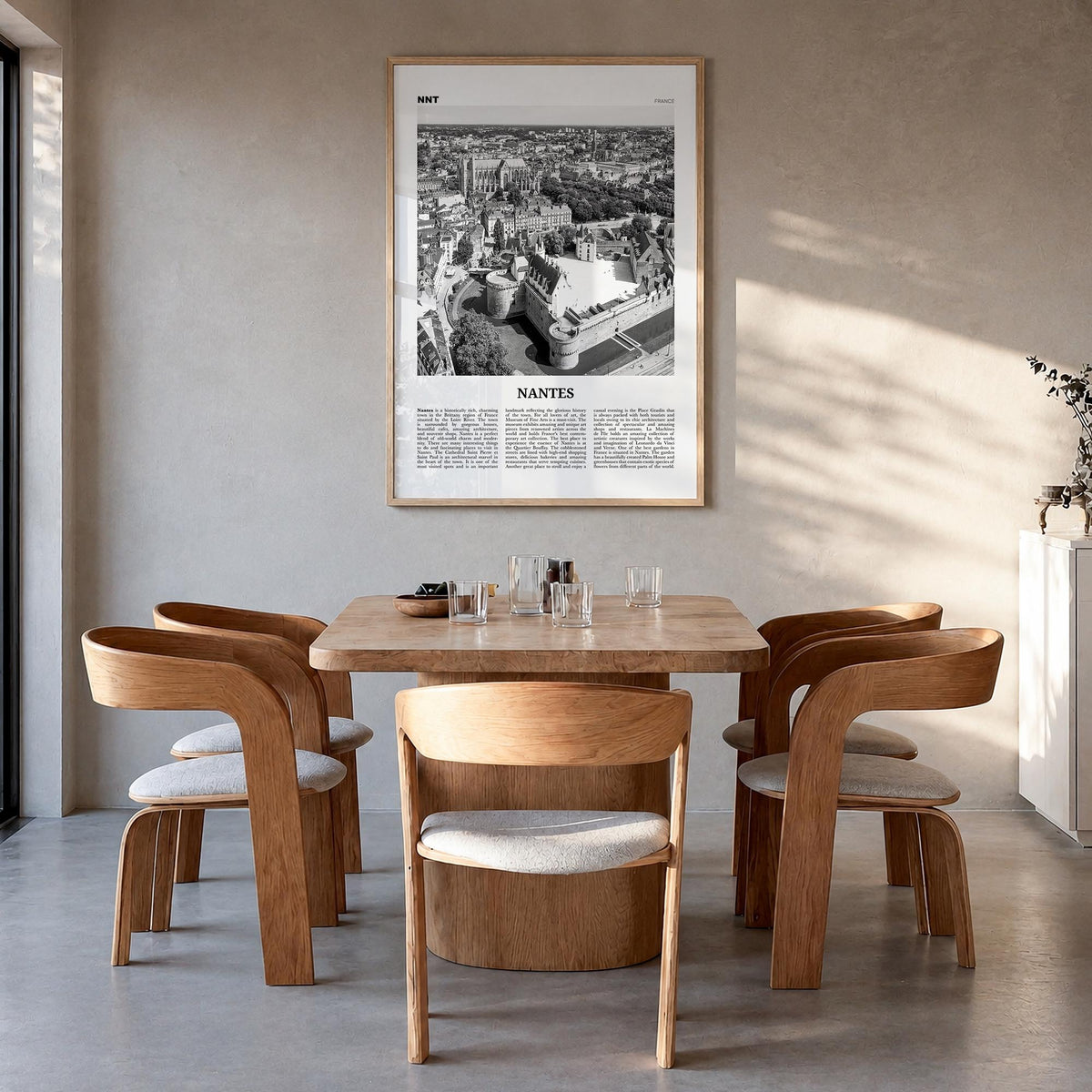 Nantes black & white newspaper poster of France – vertical wall art in natural wood frame, hanging on wall