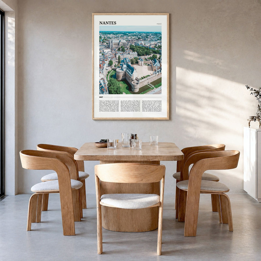 Nantes Travel Poster in a natural wood frame, hanging in a dining room