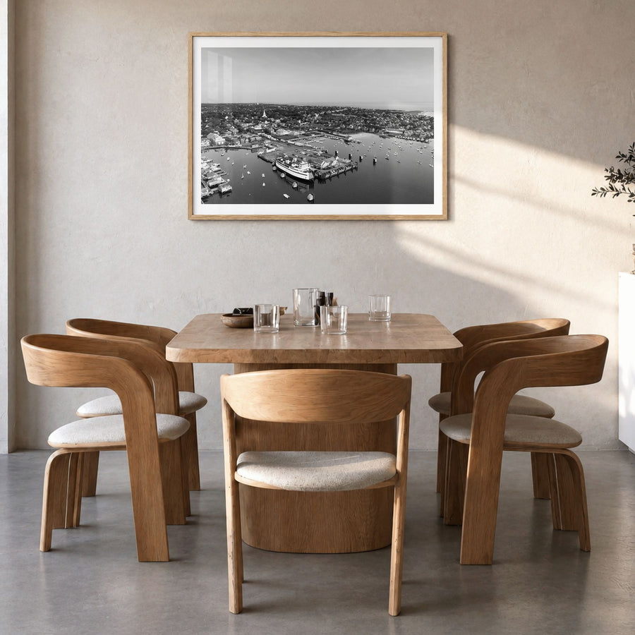 Nantucket Photo Poster in a natural wood frame, hanging in a dining room, white border