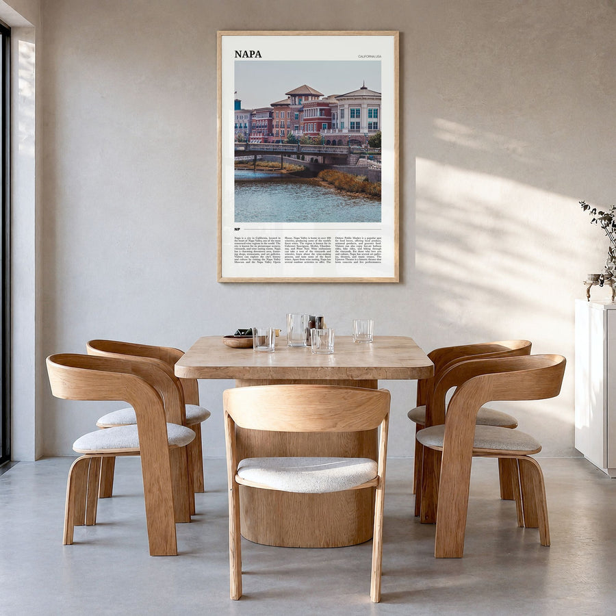 Napa Travel Poster in a natural wood frame, hanging in a dining room