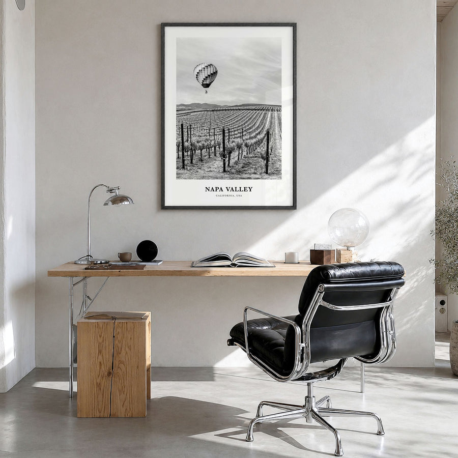 Napa Valley Classic Poster in a black wood frame, hanging in a bright home office