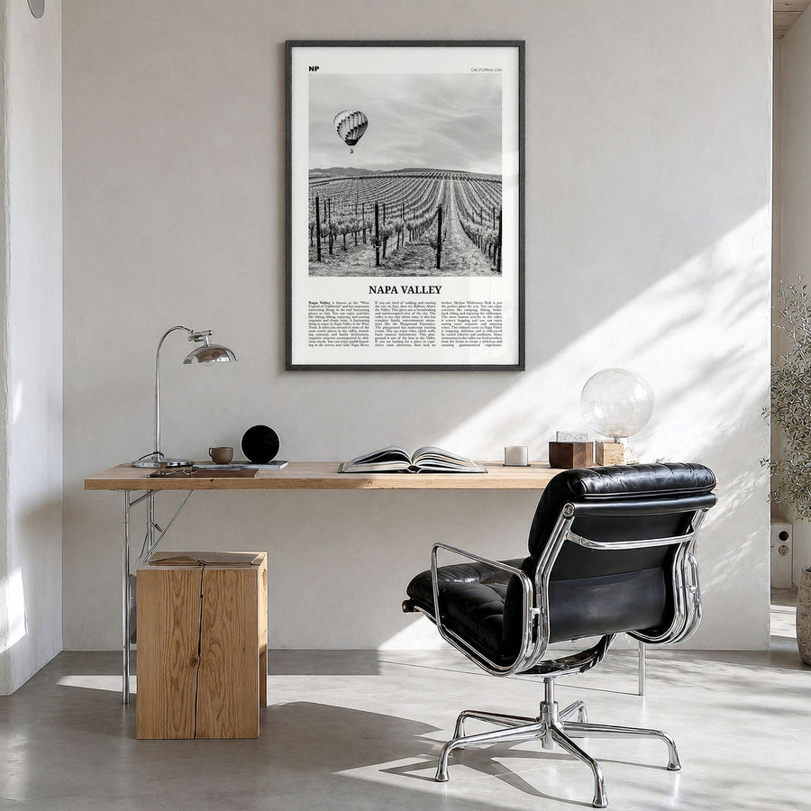 Napa Valley Newspaper Poster in a black wood frame, hanging in a bright home office