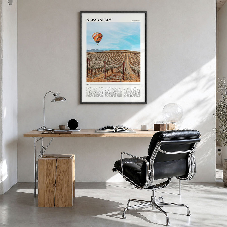 Napa Valley Travel Poster in a black wood frame, hanging in a bright home office