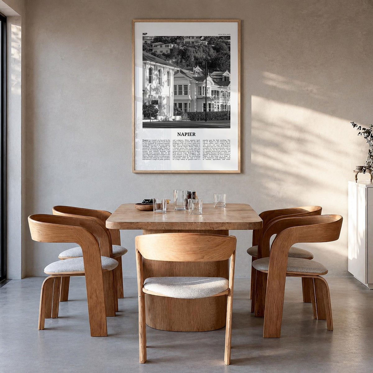 Napier black & white newspaper poster of New Zealand – vertical wall art in natural wood frame, hanging on wall