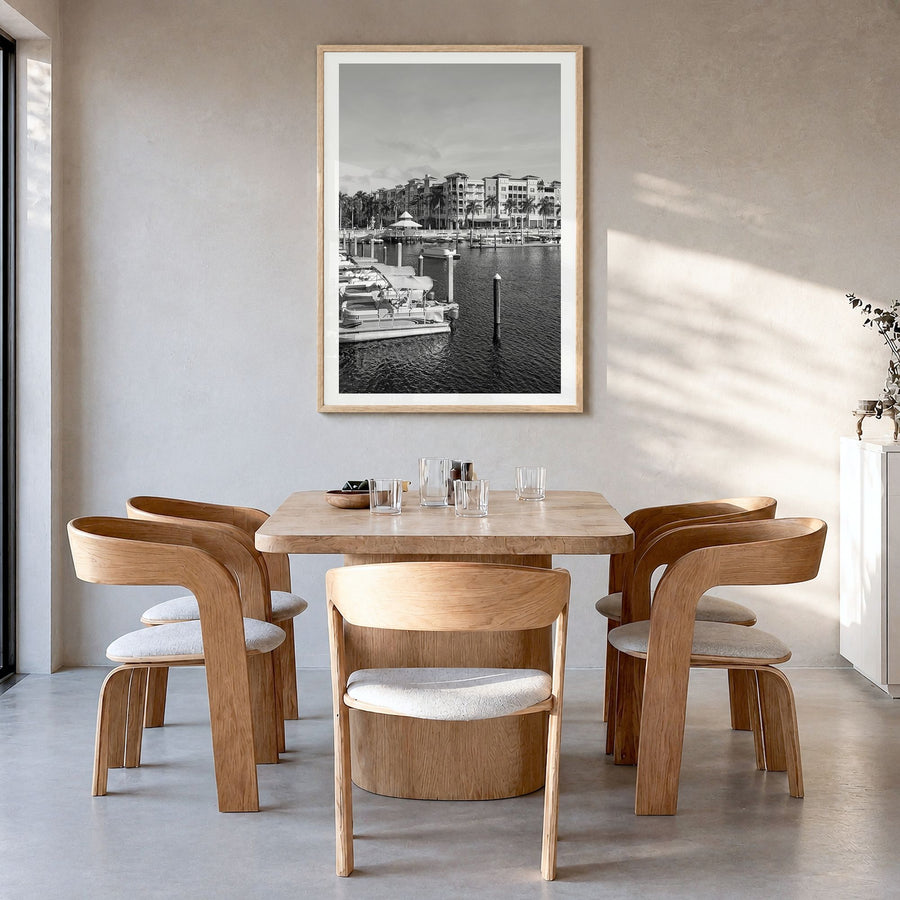 Naples, Florida Photo Poster in a natural wood frame, hanging in a dining room, white border