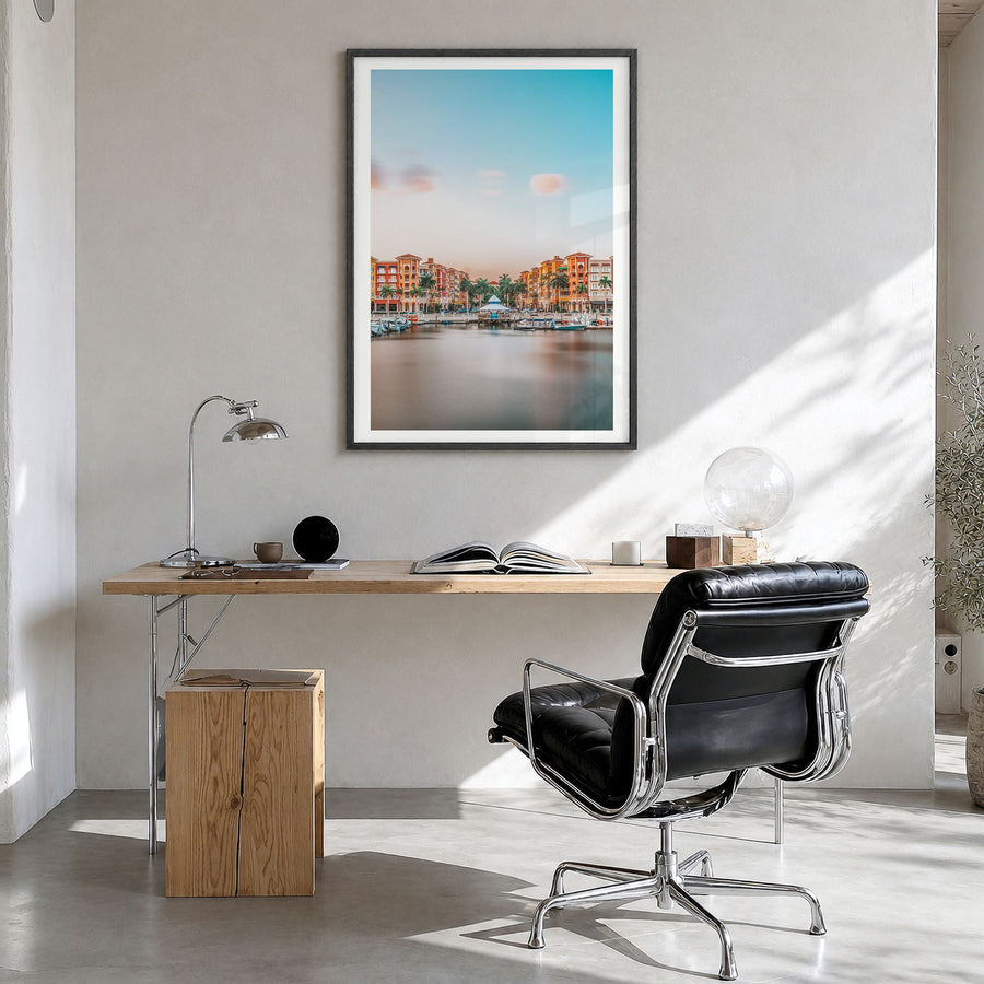 Naples, Florida Photo Poster in a black wood frame, hanging in a bright home office, white border