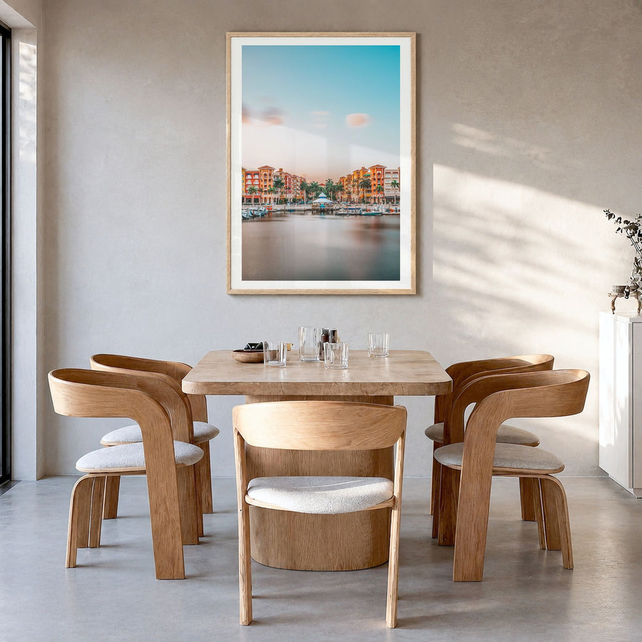 Naples, Florida Photo Poster in a natural wood frame, hanging in a dining room, white border