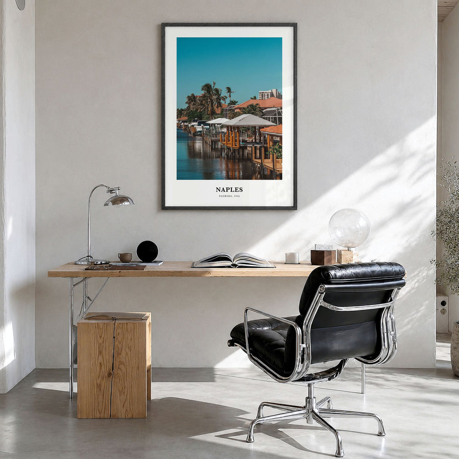 Naples, Florida Classic No 2 Poster in a black wood frame, hanging in a bright home office