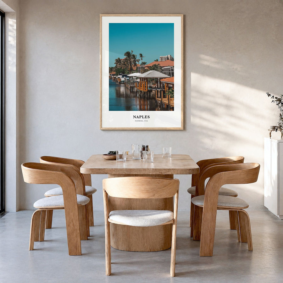 Naples, Florida Classic No 2 Poster in a natural wood frame, hanging in a dining room