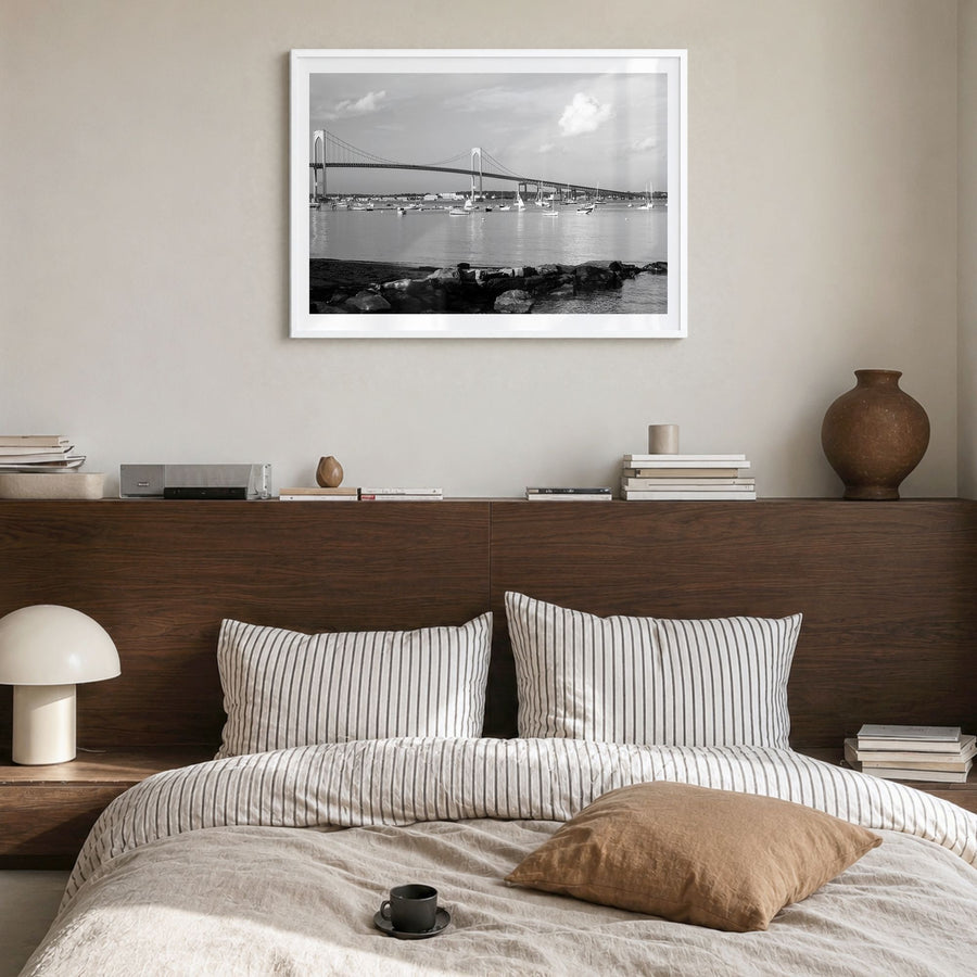 Narragansett Photo Poster in a white wood frame, hanging in a bedroom, white border