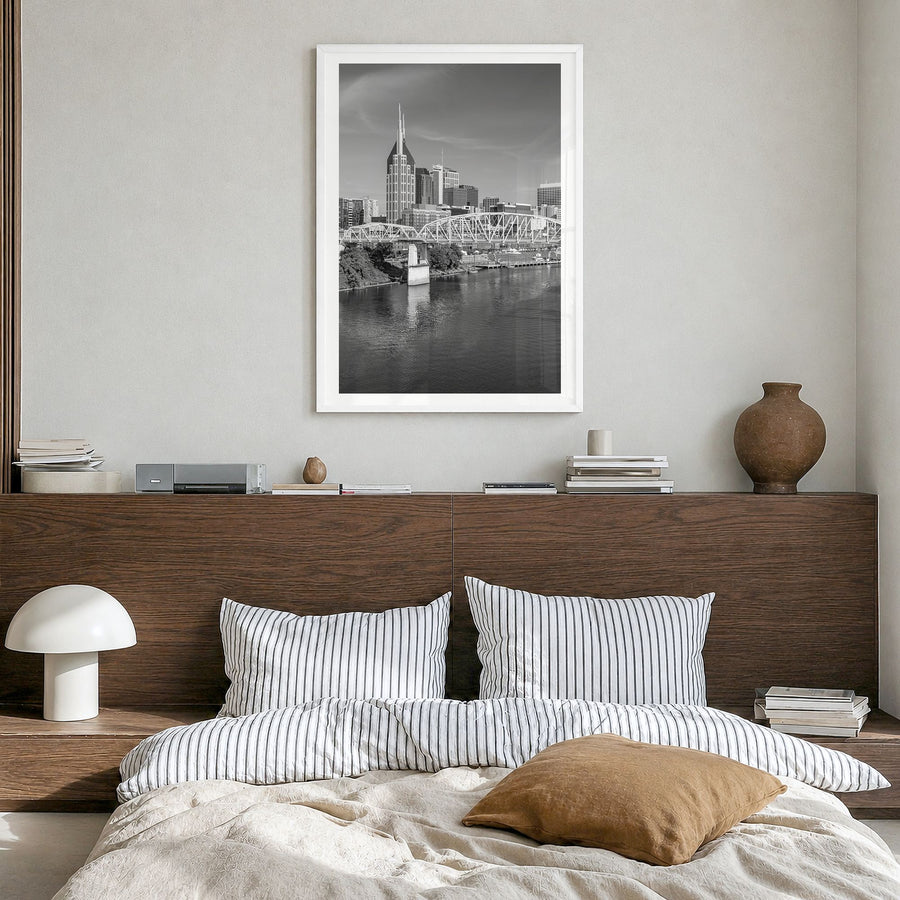 Nashville Photo Poster in a white wood frame, hanging in a bedroom, white border