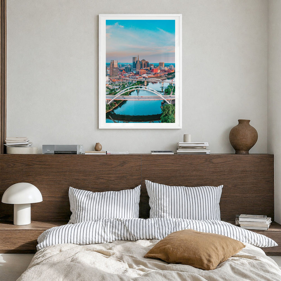 Nashville Photo Poster in a white wood frame, hanging in a bedroom, white border