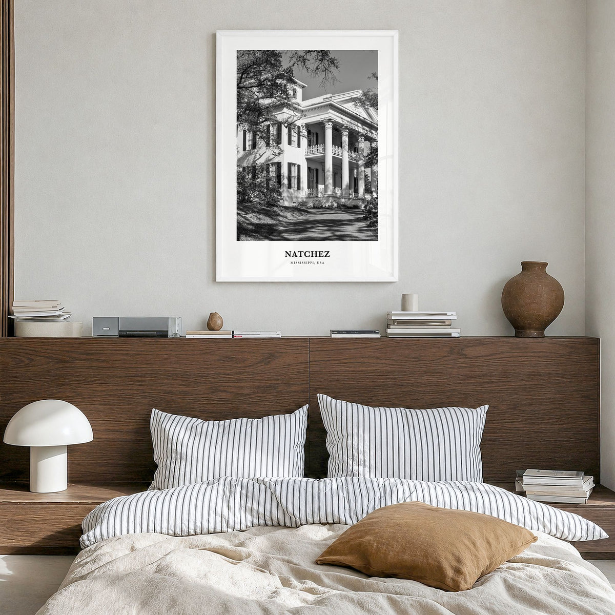 Natchez Classic Poster in a white wood frame, hanging in a bedroom