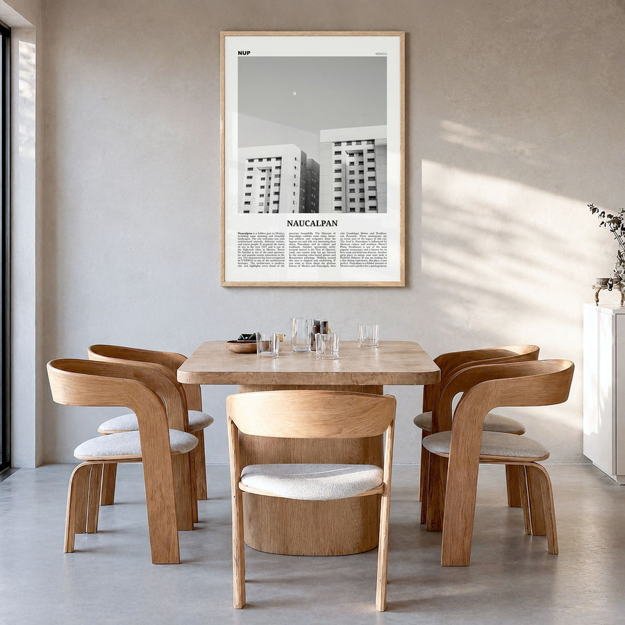 Naucalpan Newspaper Poster in a natural wood frame, hanging in a dining room