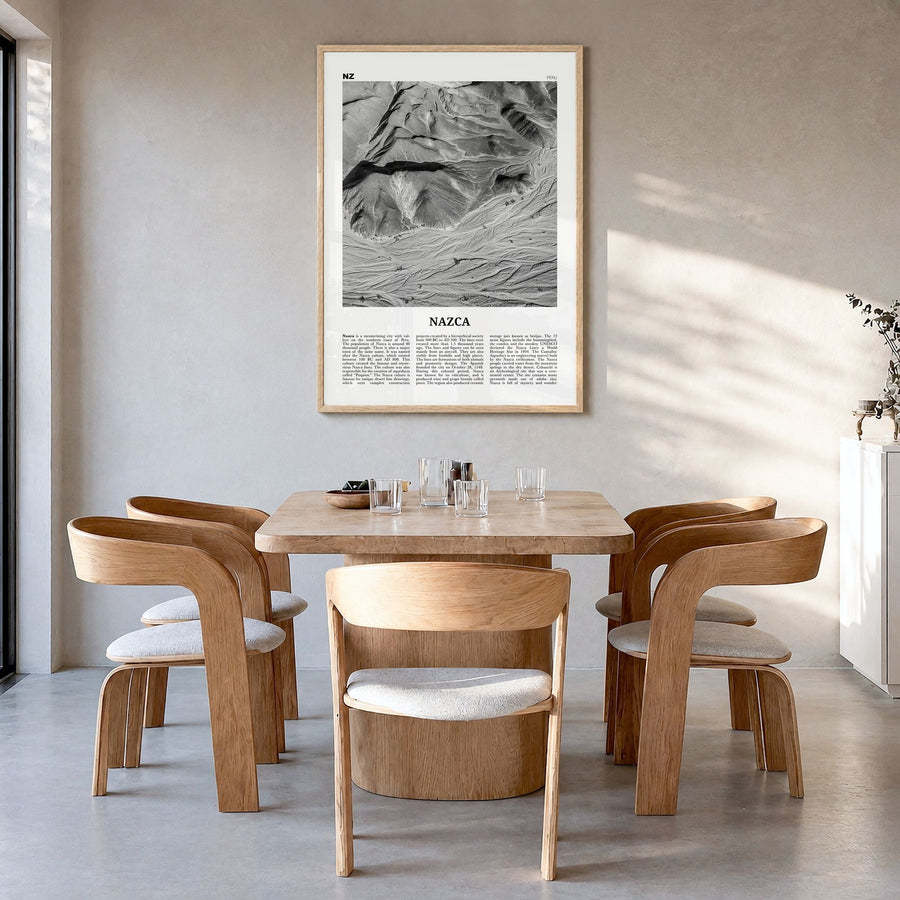 Nazca Newspaper Poster in a natural wood frame, hanging in a dining room